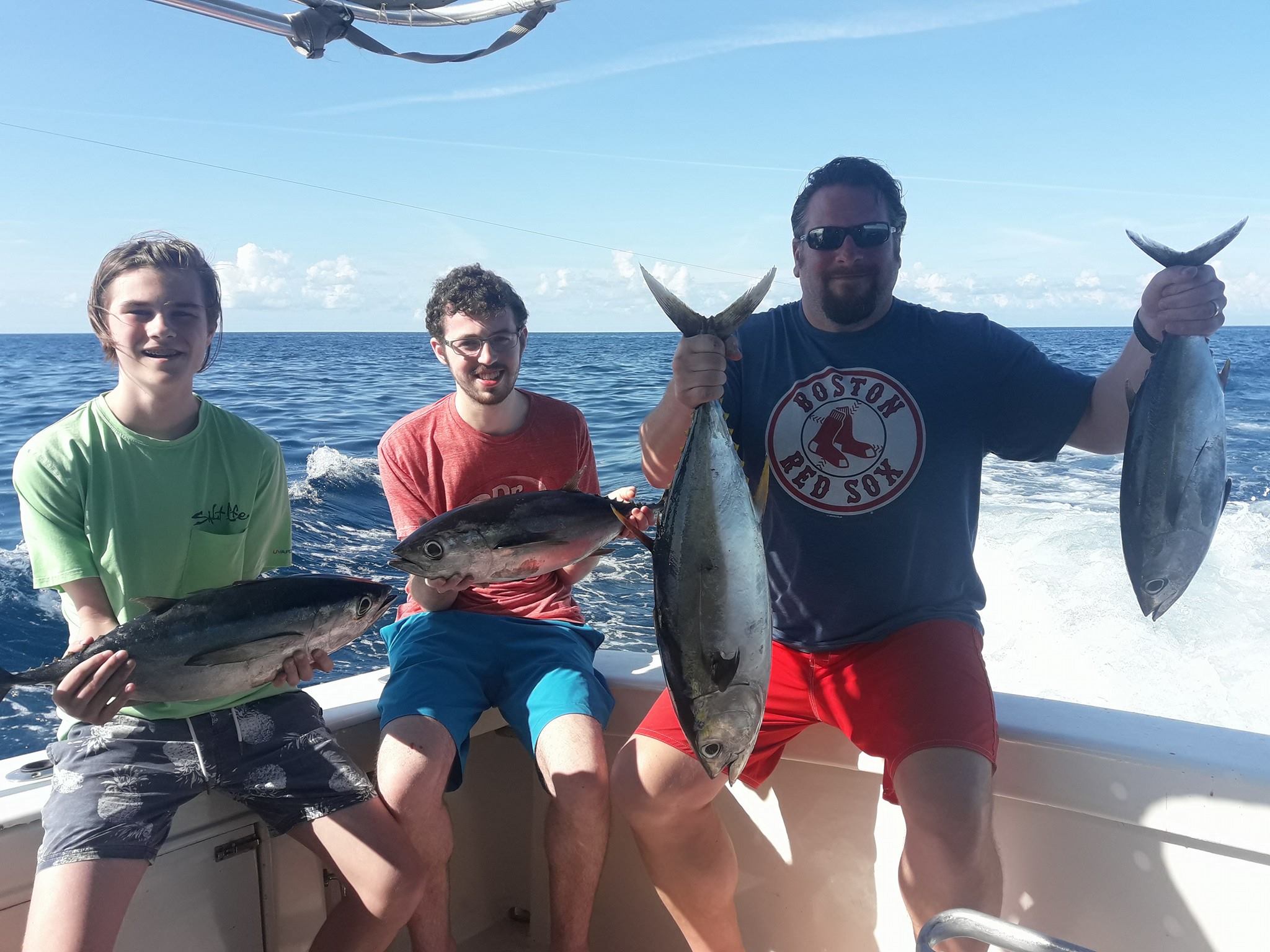 4 little tunny and yellowfin tuna fish caught during cruises and fishing trip in nassau