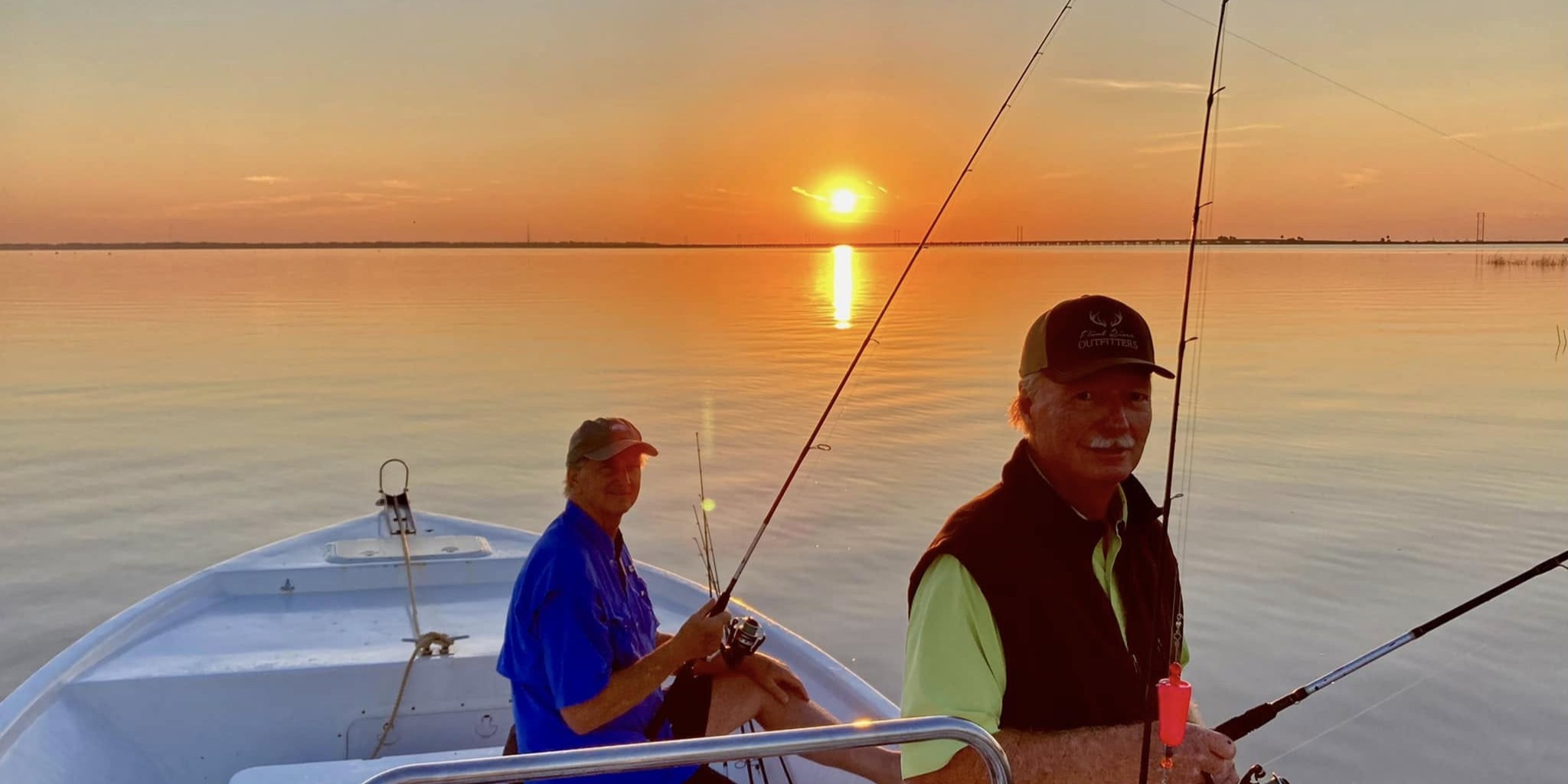 Apalachicola Bay eco tour boat cruising pristine waters with dolphins and coastal wildlife