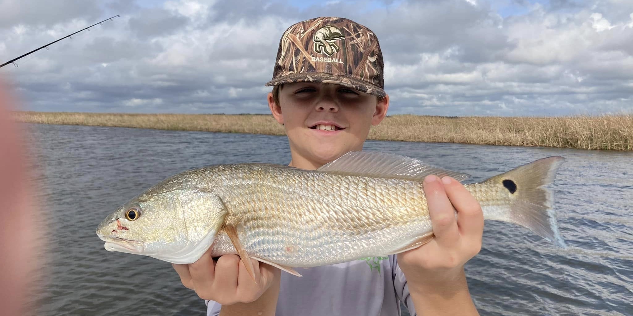 Apalachicola Bay inshore fishing charter boat with Captain Rudy targeting redfish and flounder