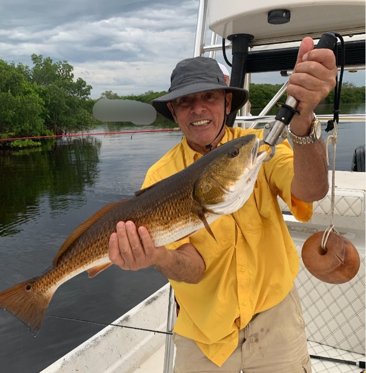 One person holding a fishing rod in Punta Gorda