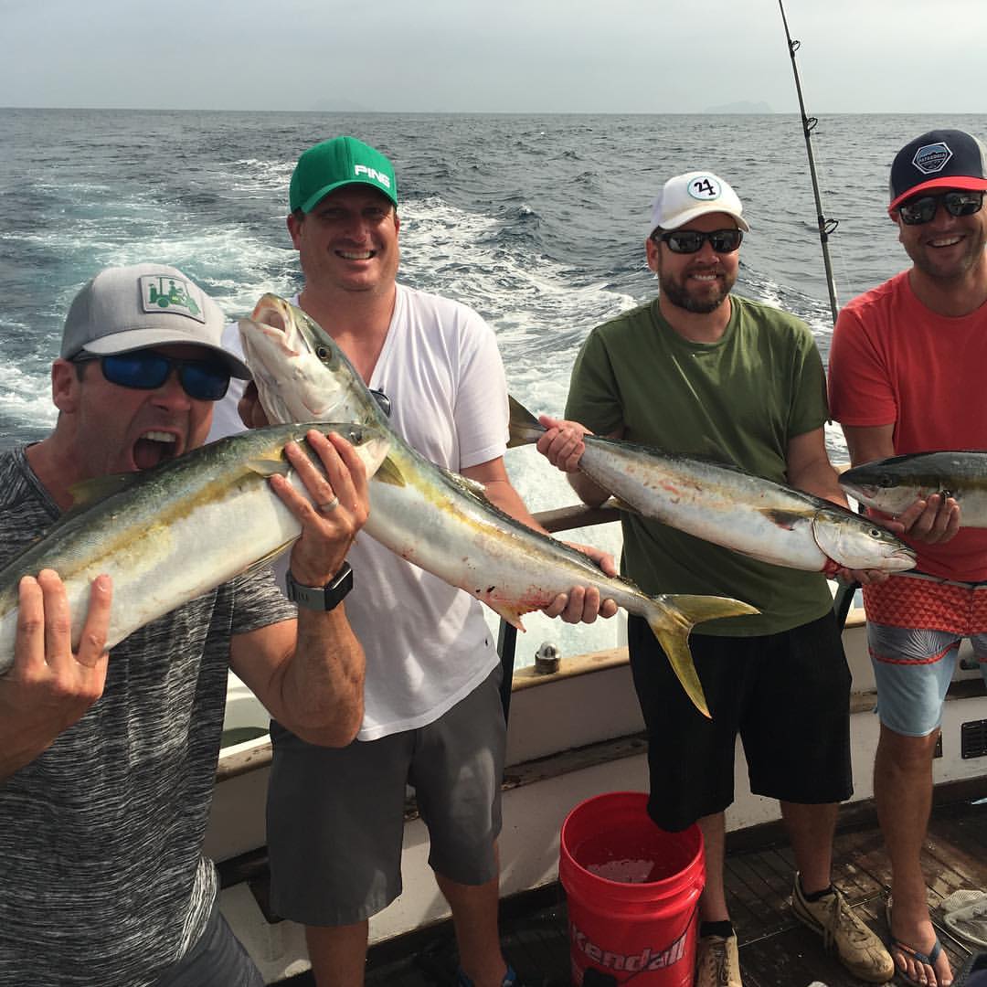 Two anglers holding big fish in California