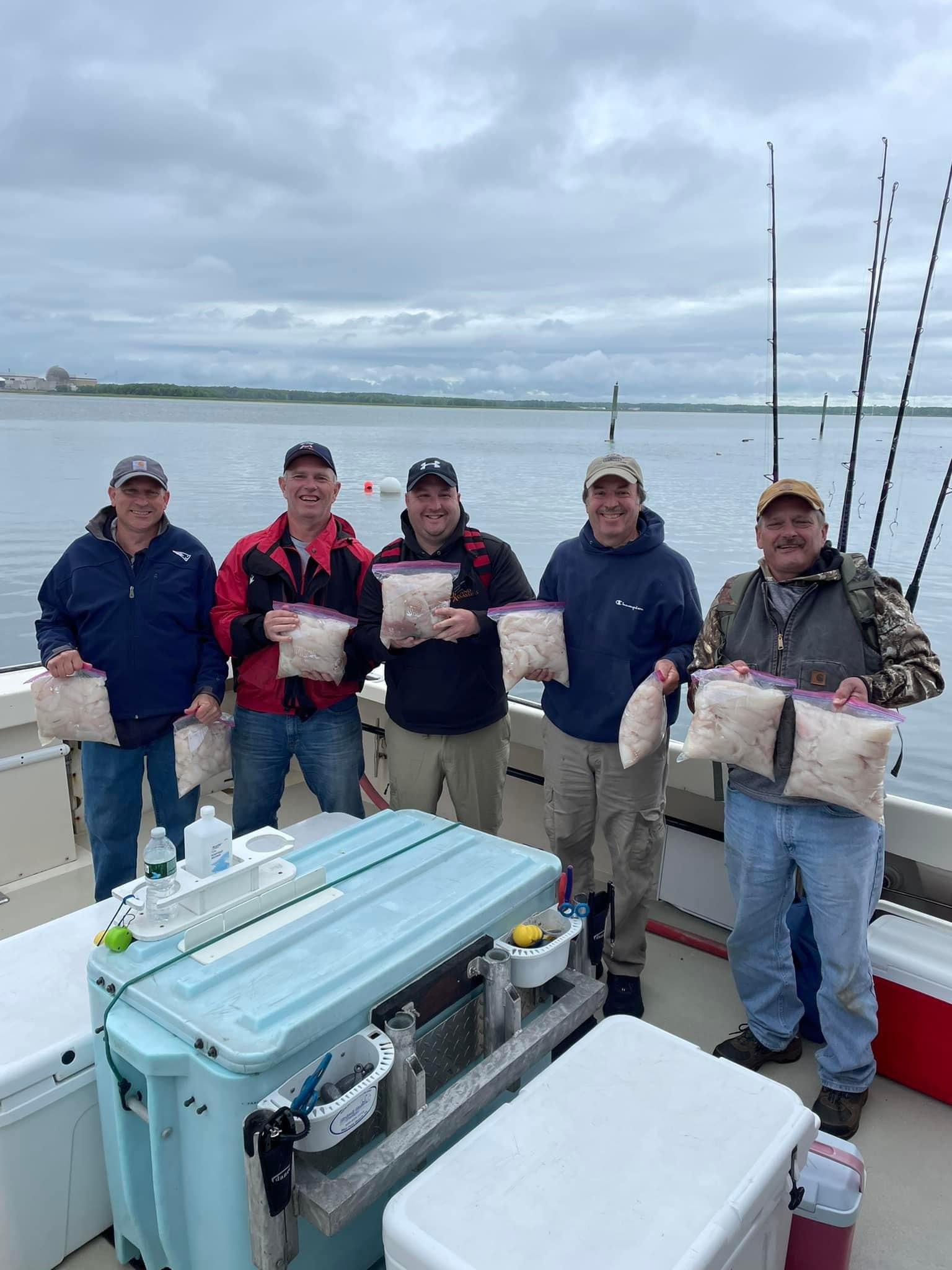 Five people fishing together in Seabrook