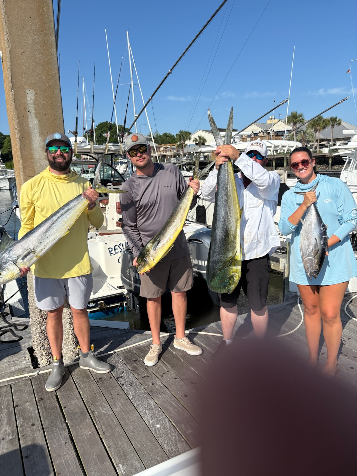 Successful fishing trip displaying fresh caught Mahi Mahi and Yellowfin Tuna at Seabrook Island SC marina