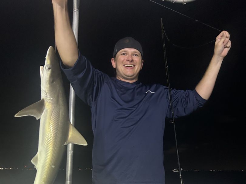 Shark fishing charter boat in Panama City Beach Florida Gulf waters targeting blacktip sharks