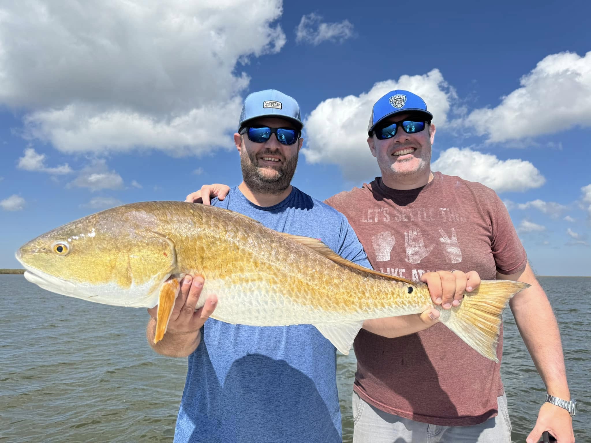 A couple enjoying a fishing trip in the beautiful city of Venice