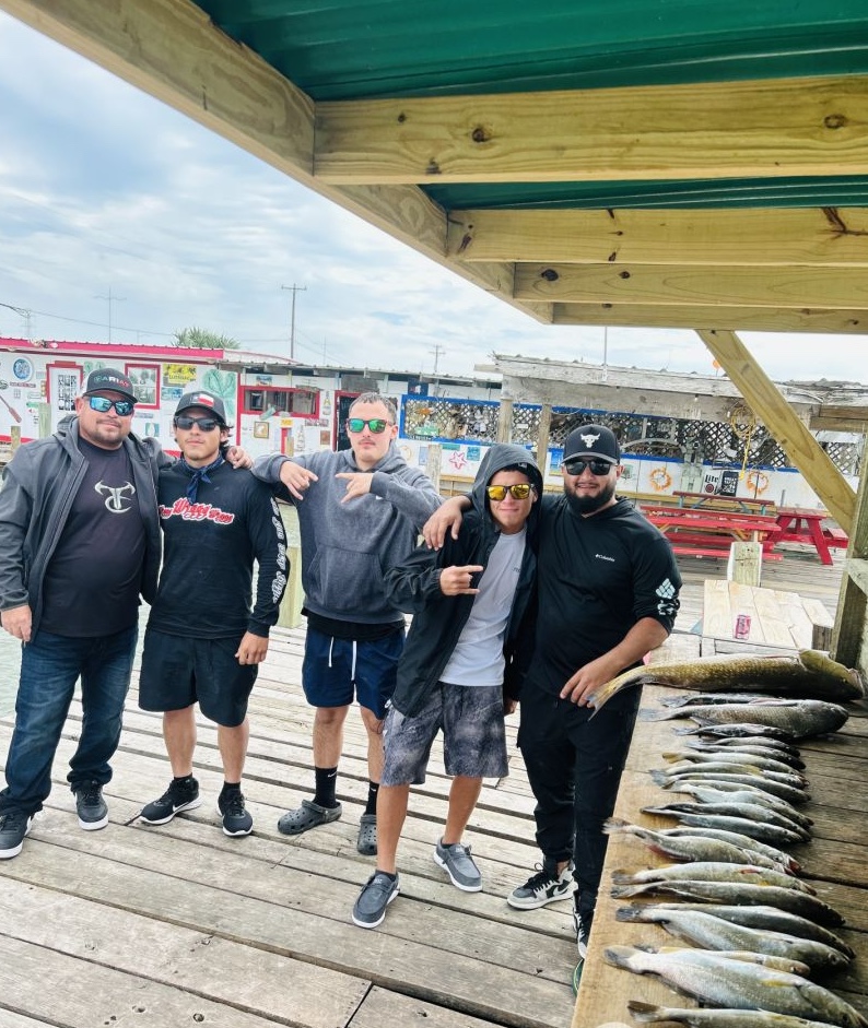 5 people fishing in TX