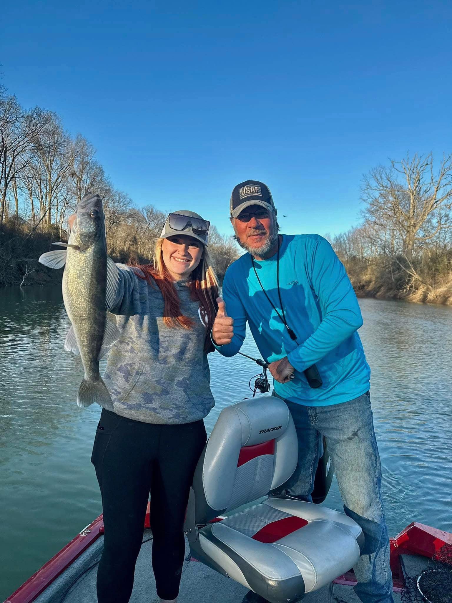 Two anglers with a big 21-inch fish in Rogers
