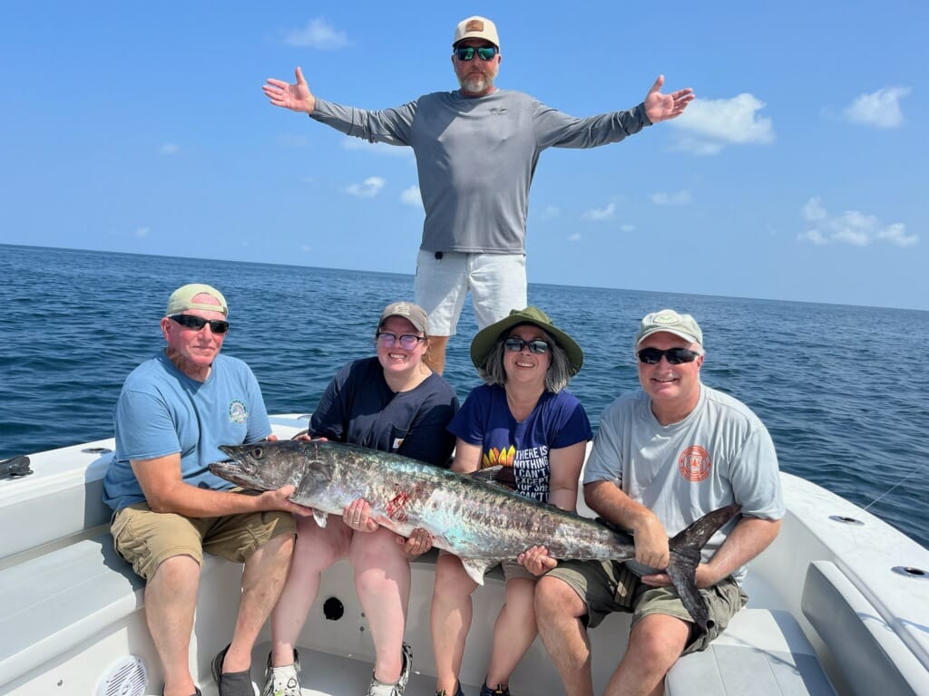 5 people fishing on Dauphin Island