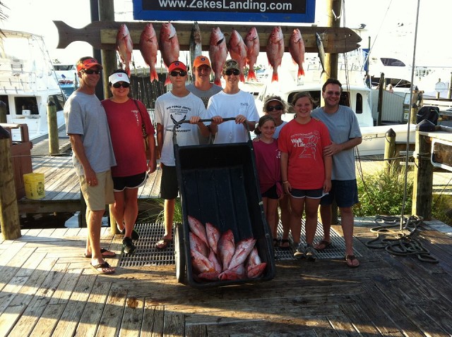group of 9 people fishing in alabama