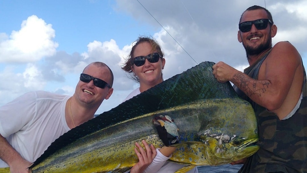 A group of 3 people fishing in FL
