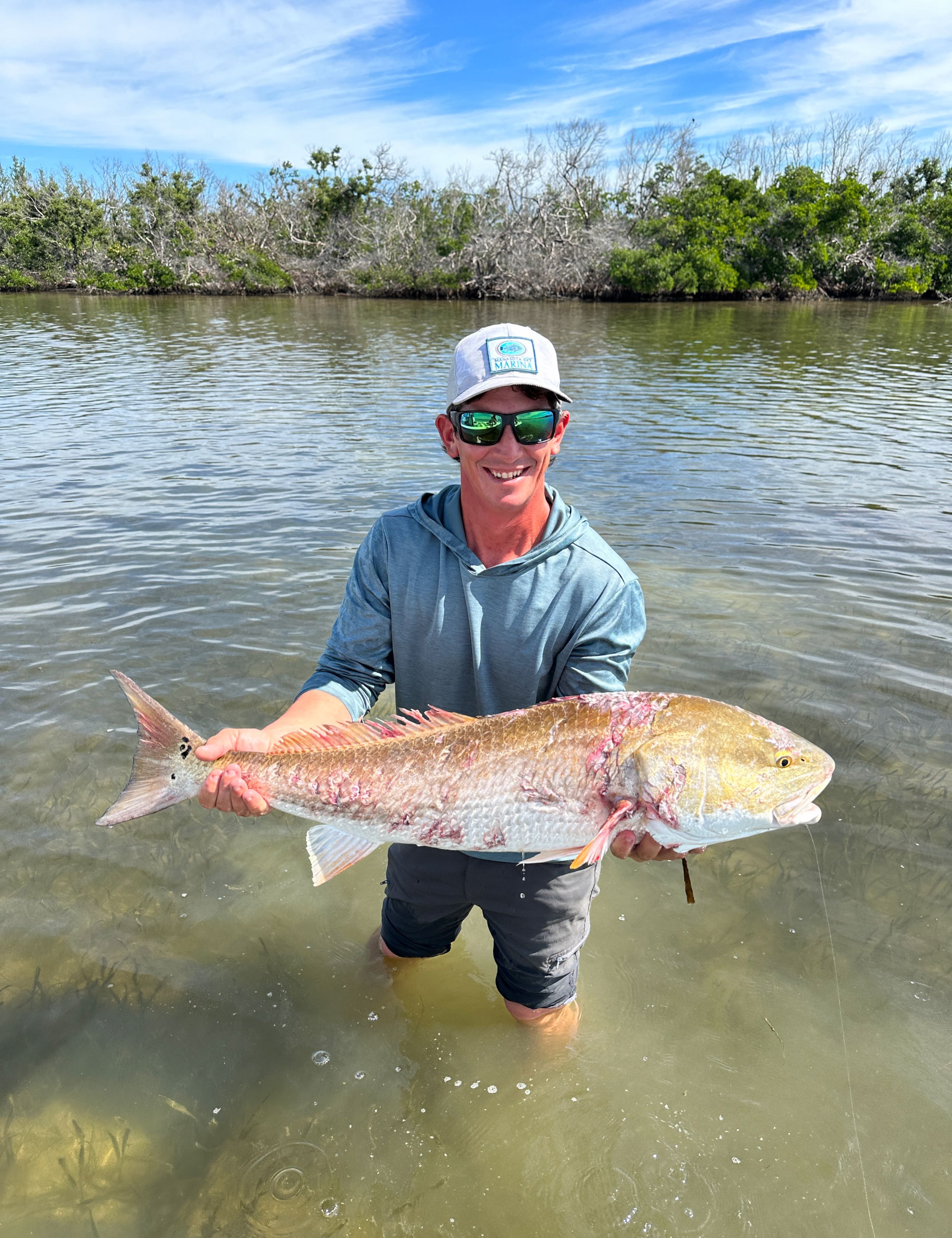 A person fishing in Placida