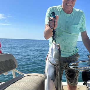 A person fishing in FL