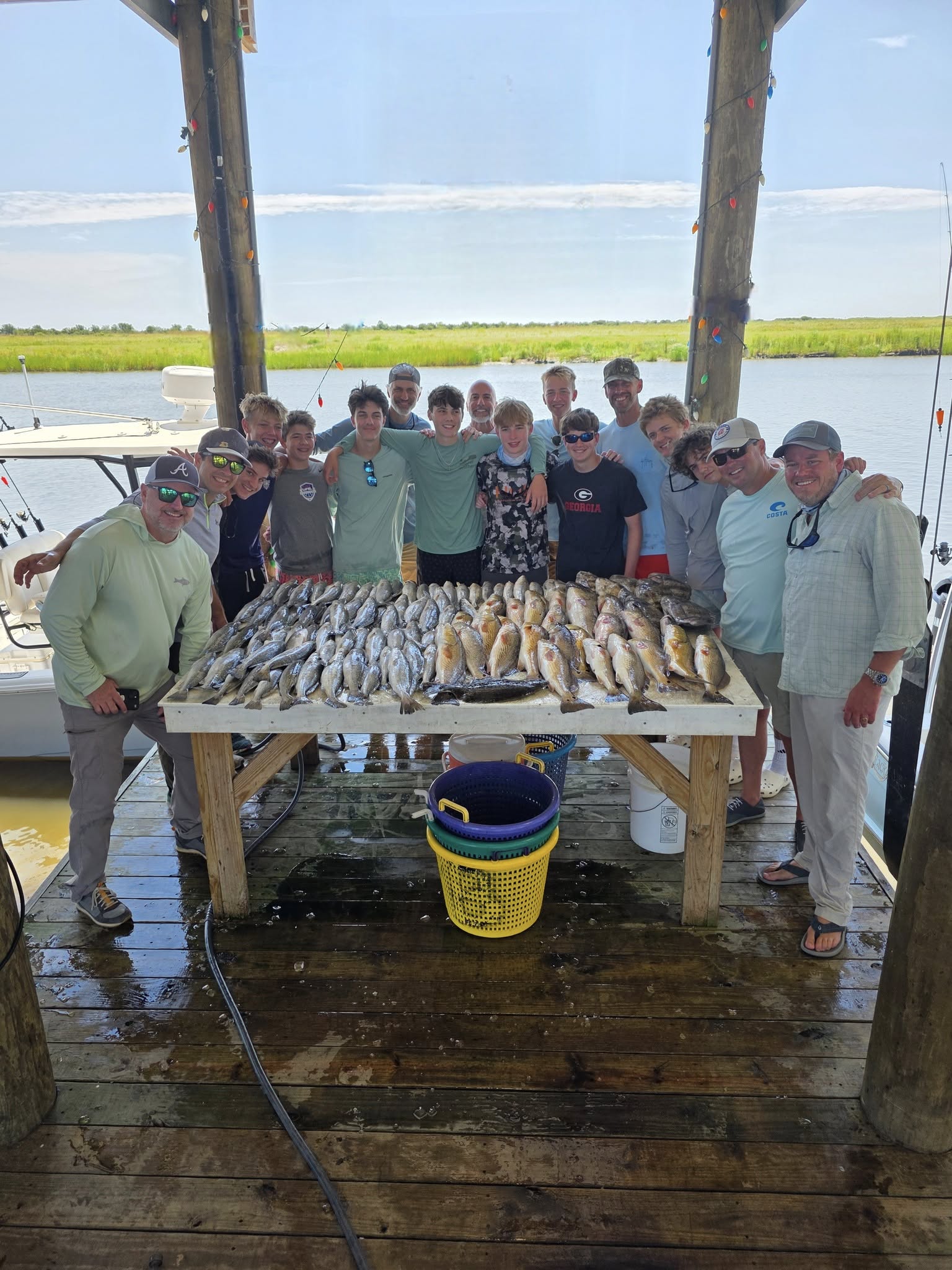 Group of 16 people fishing in LA