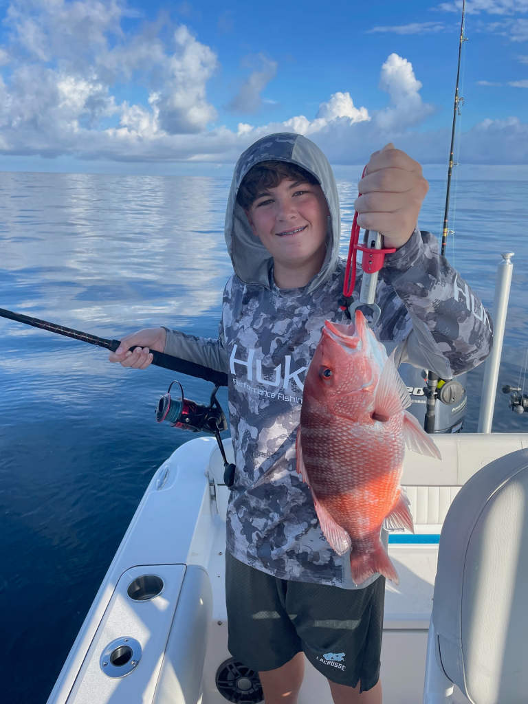 Angler with a 16-inch fish at Murrells Inlet