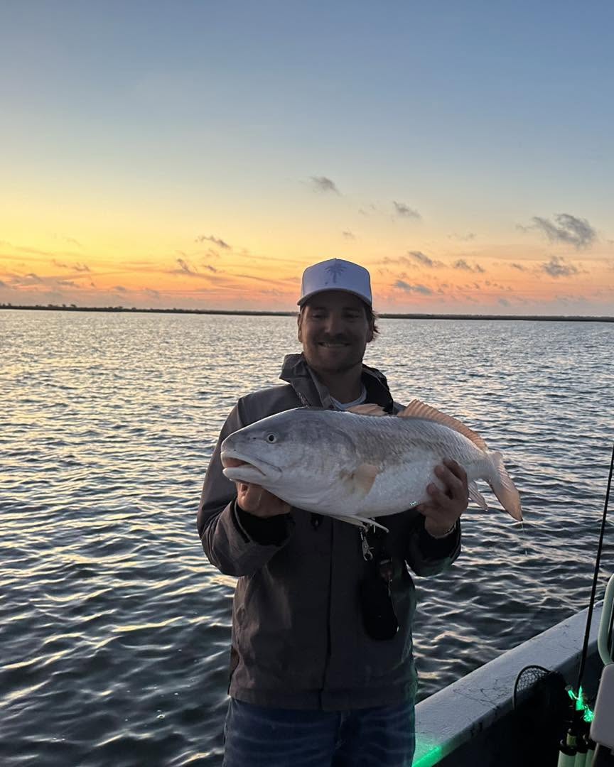 Redfish catch on Bolivar Peninsula TX during sunset fishing trip