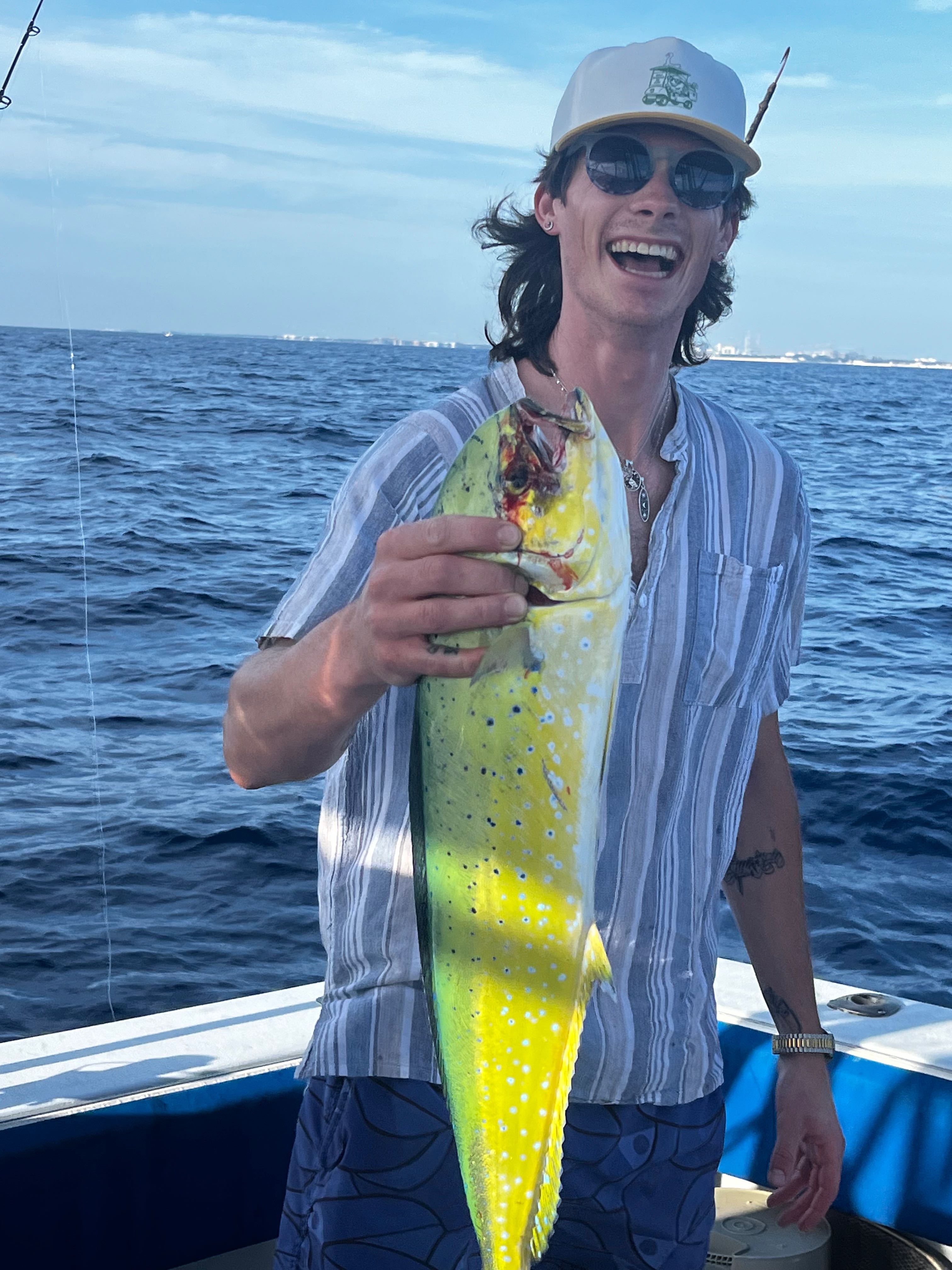 Mahi mahi catch displayed on fishing boat in Riviera Beach FL waters