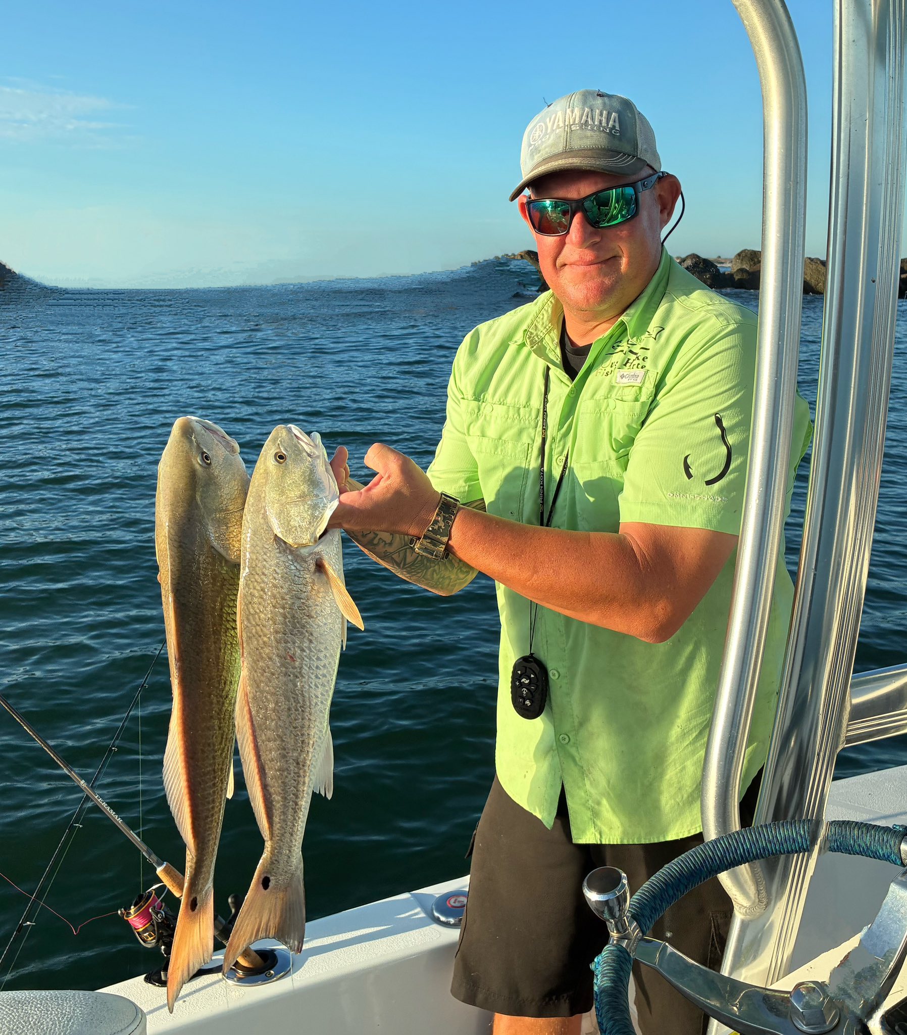 Two redfish caught while fishing in Volusia County