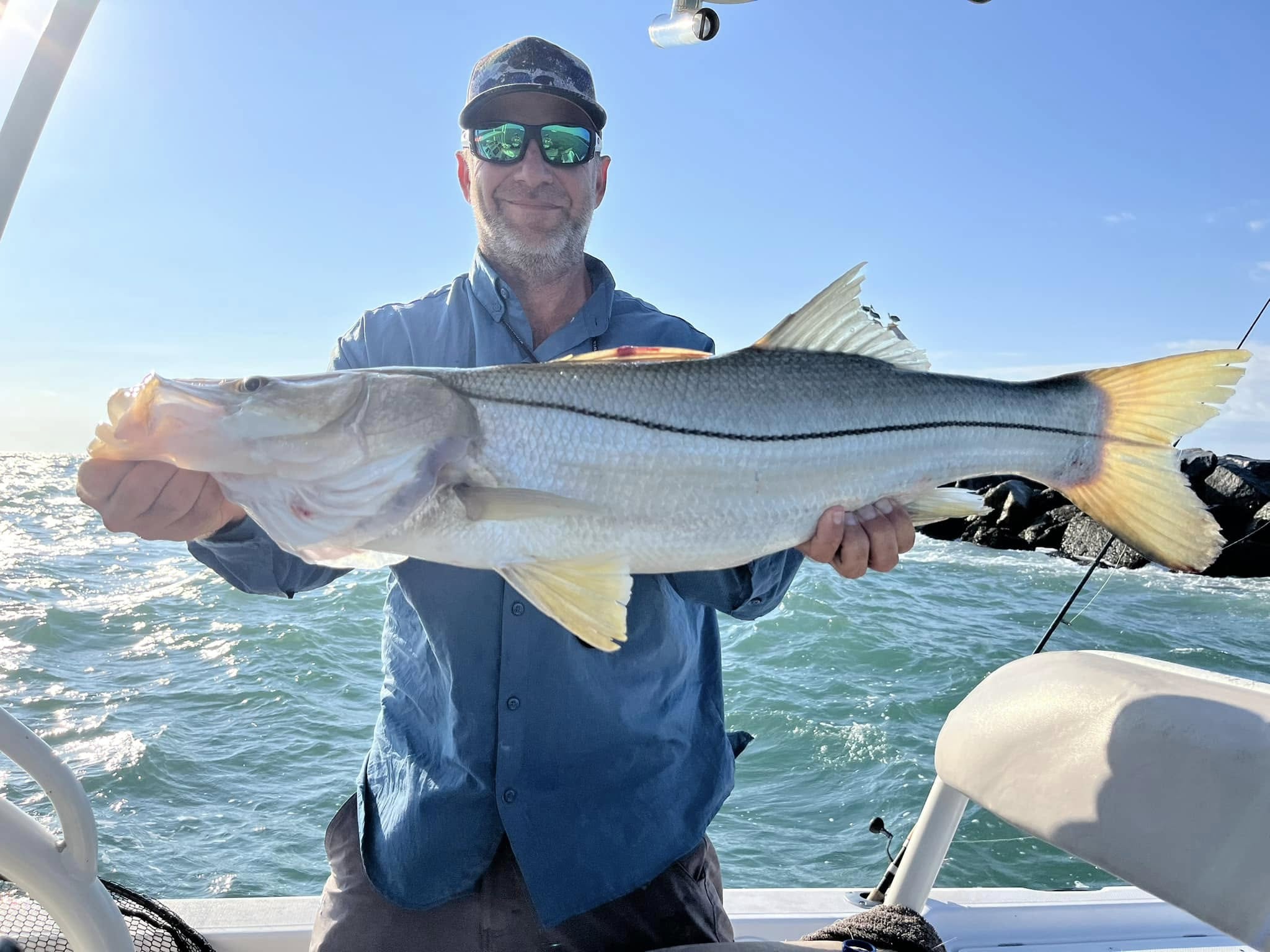 Guided inshore fishing trip on 22' Pathfinder boat in Mosquito Lagoon targeting redfish and trout