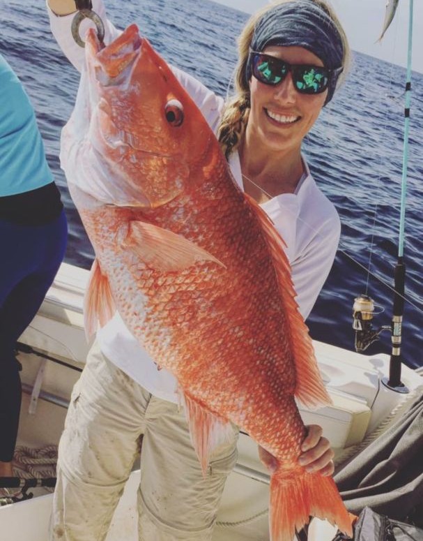 Angler with fishing rod in Panacea