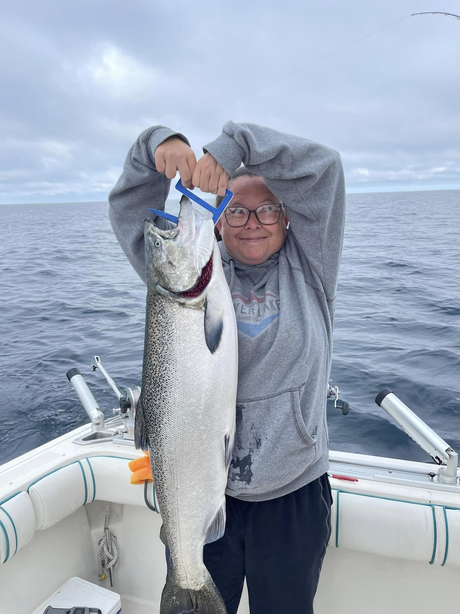 Fishing for a big lake trout in Manistee