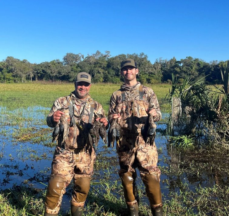 Two people hunting in Clewiston