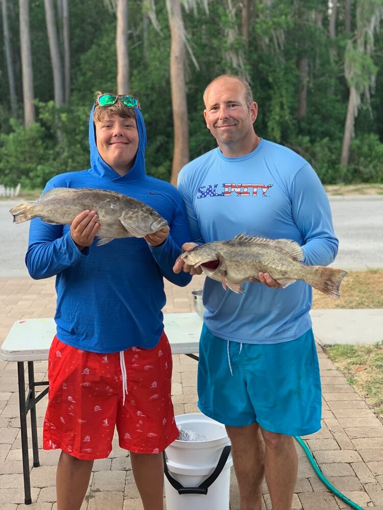 Two anglers with their catch in Florida
