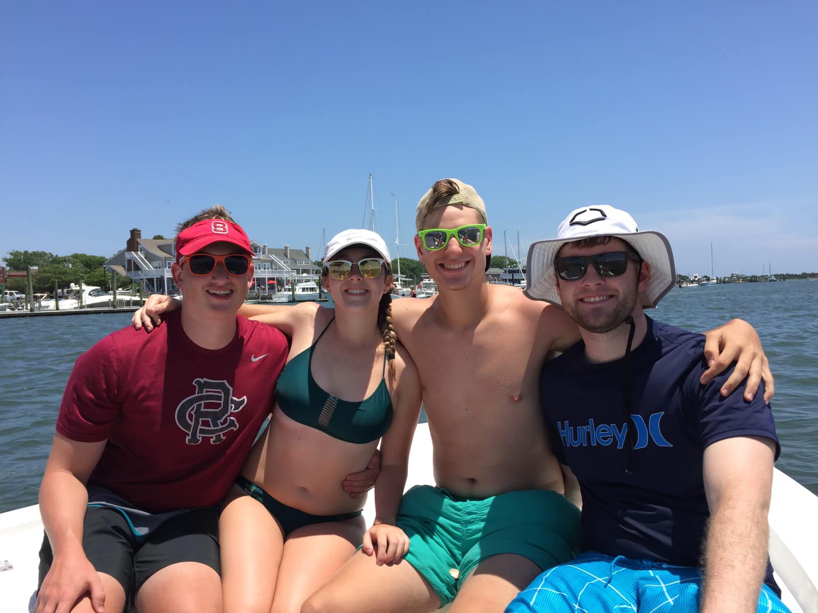 Four people enjoying fishing tours in Morehead City