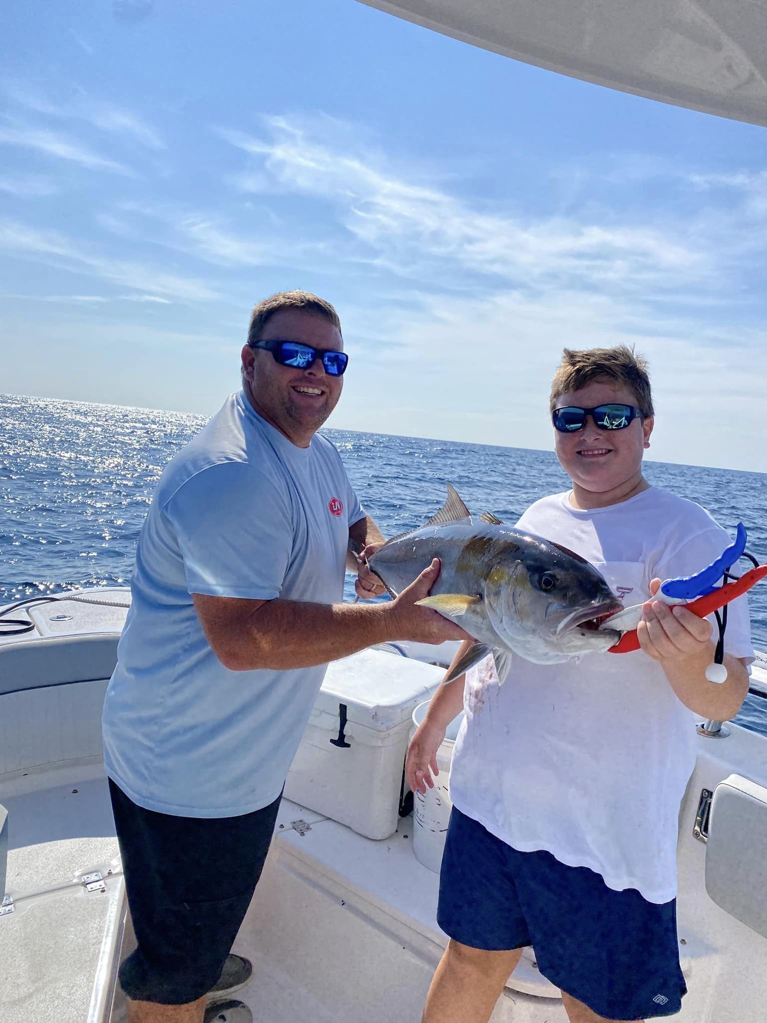 Two people fishing in Morehead City