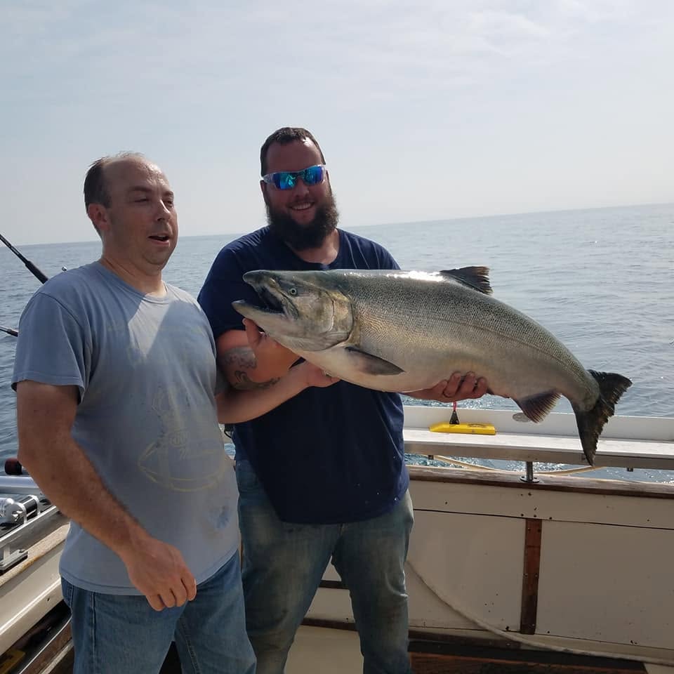 Full day Lake Michigan charter fishing boat departing Racine Wisconsin for salmon trout fishing