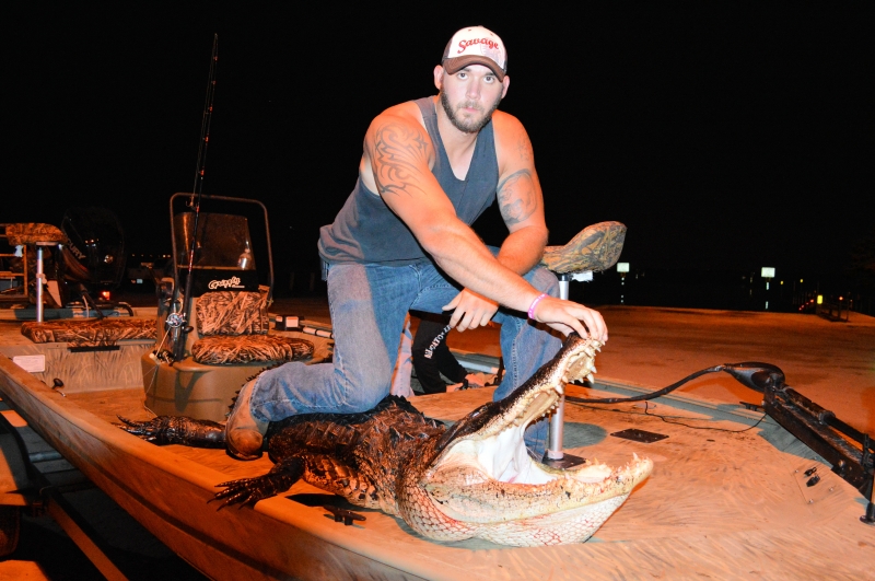 Large alligator caught during nighttime fishing trip in Saint Cloud FL