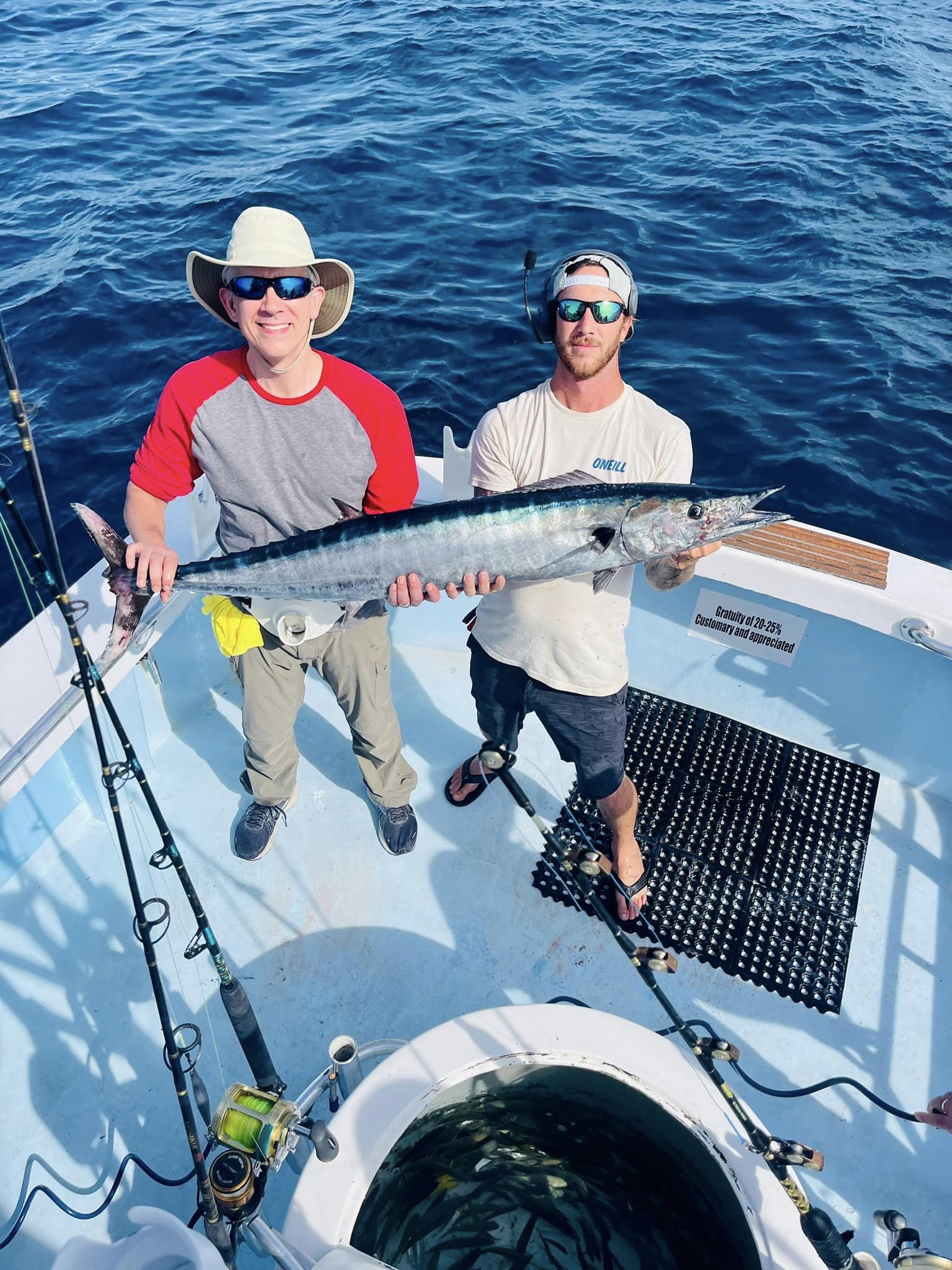 Wahoo fish caught by two people fishing in Destin