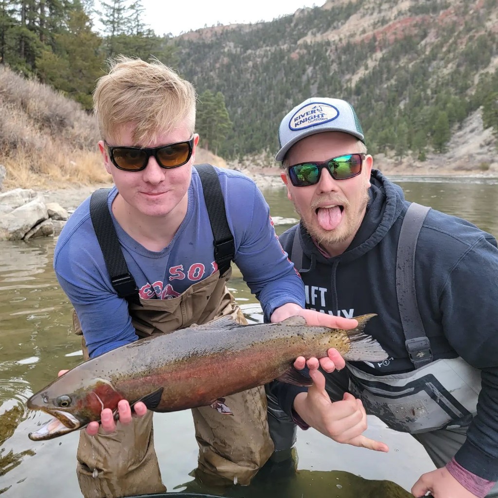 Two anglers with a 19-inch fish in MT