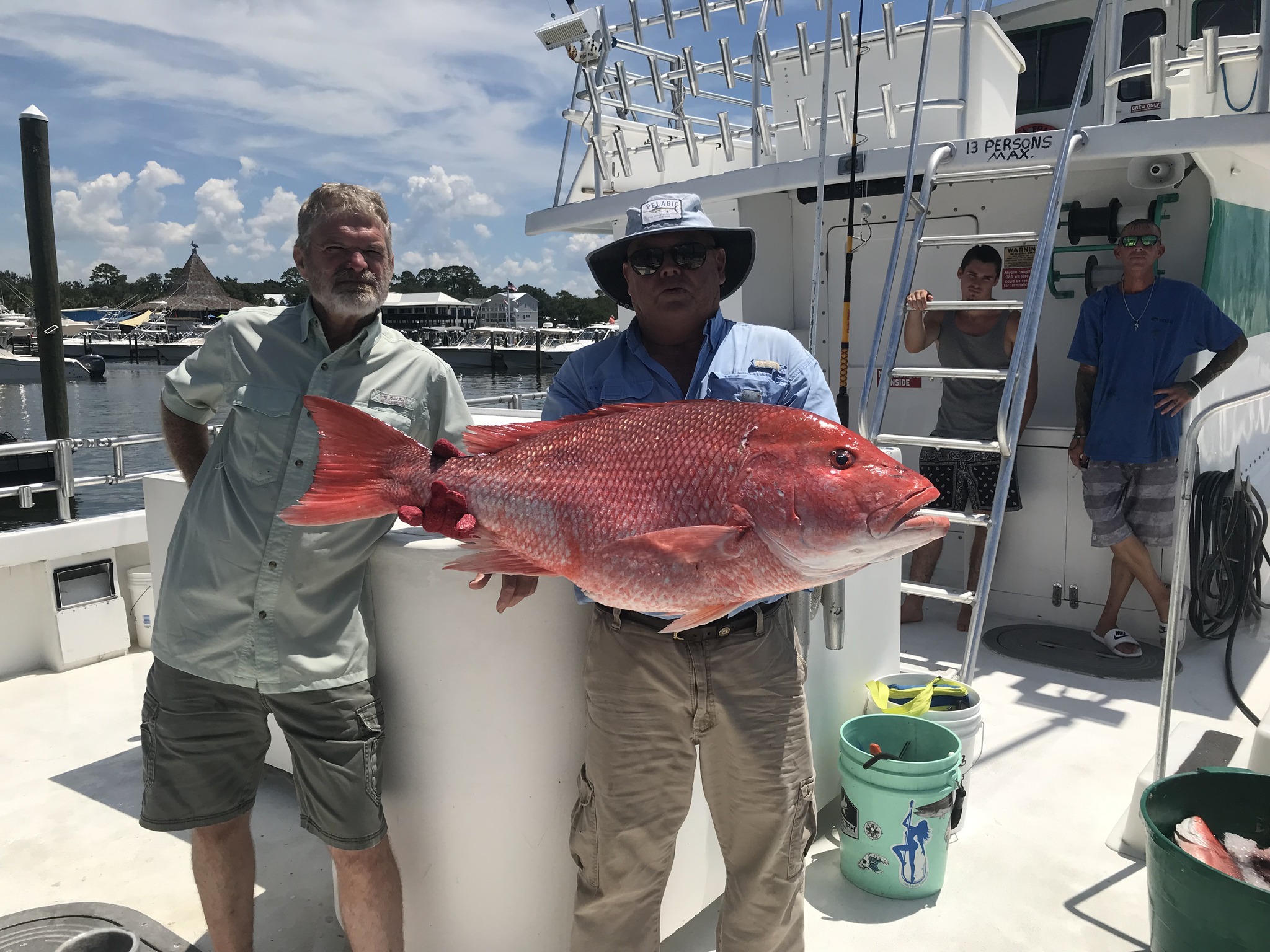 4 people fishing in Orange Beach