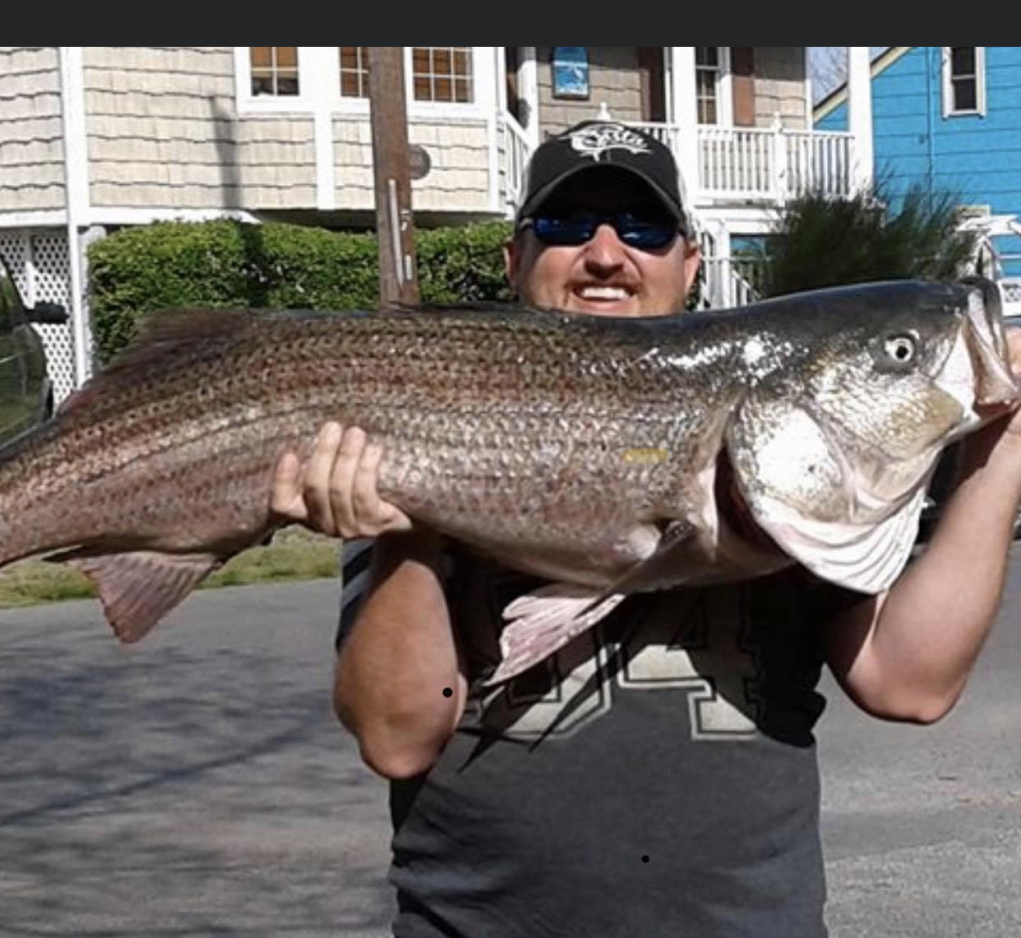 Angler fishing in Maryland with the best gear