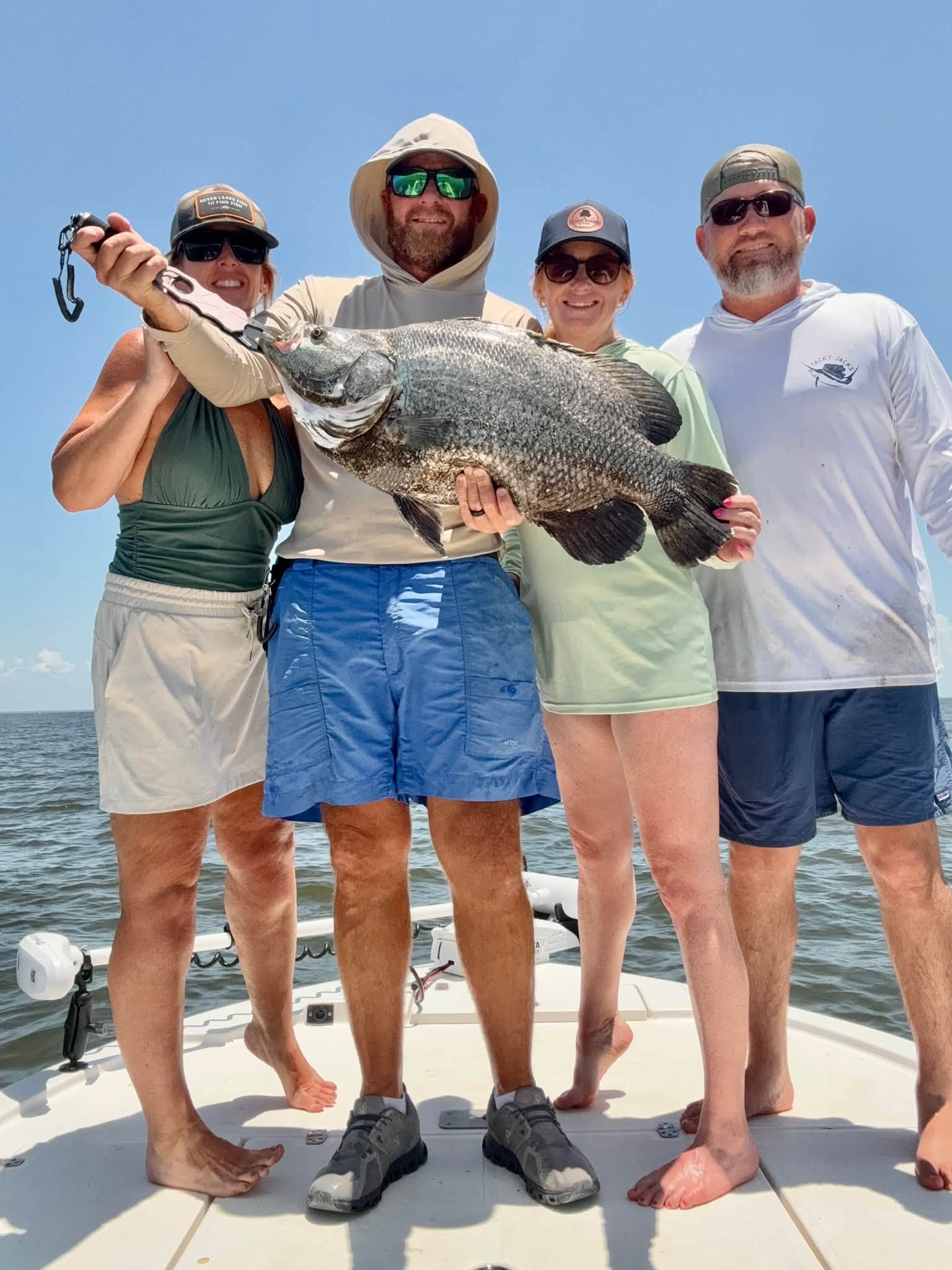 Successful tripletail fishing charter in Spanish Fort Alabama with impressive catch