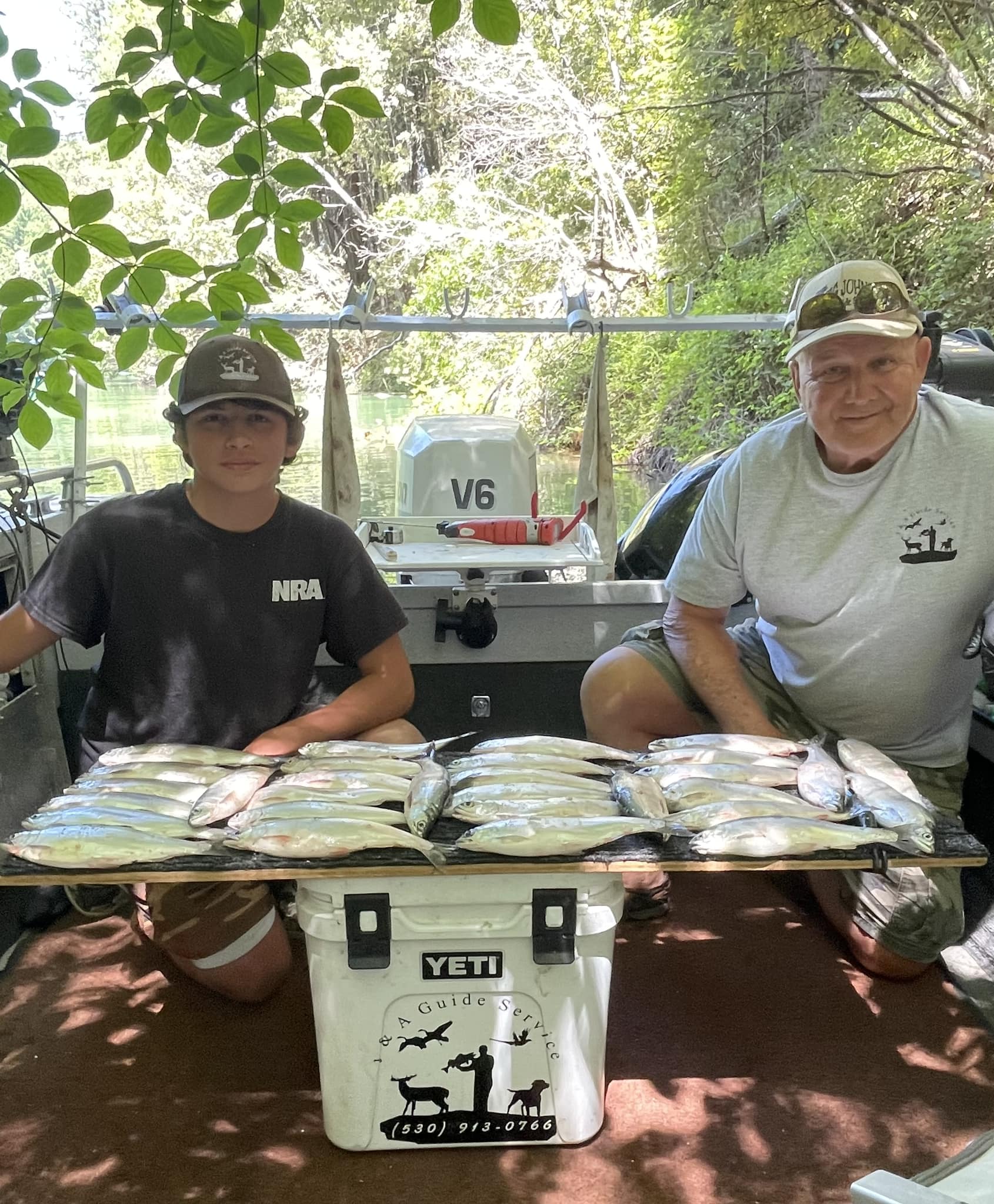 Three people enjoying a fishing and hunting trip in Penn Valley
