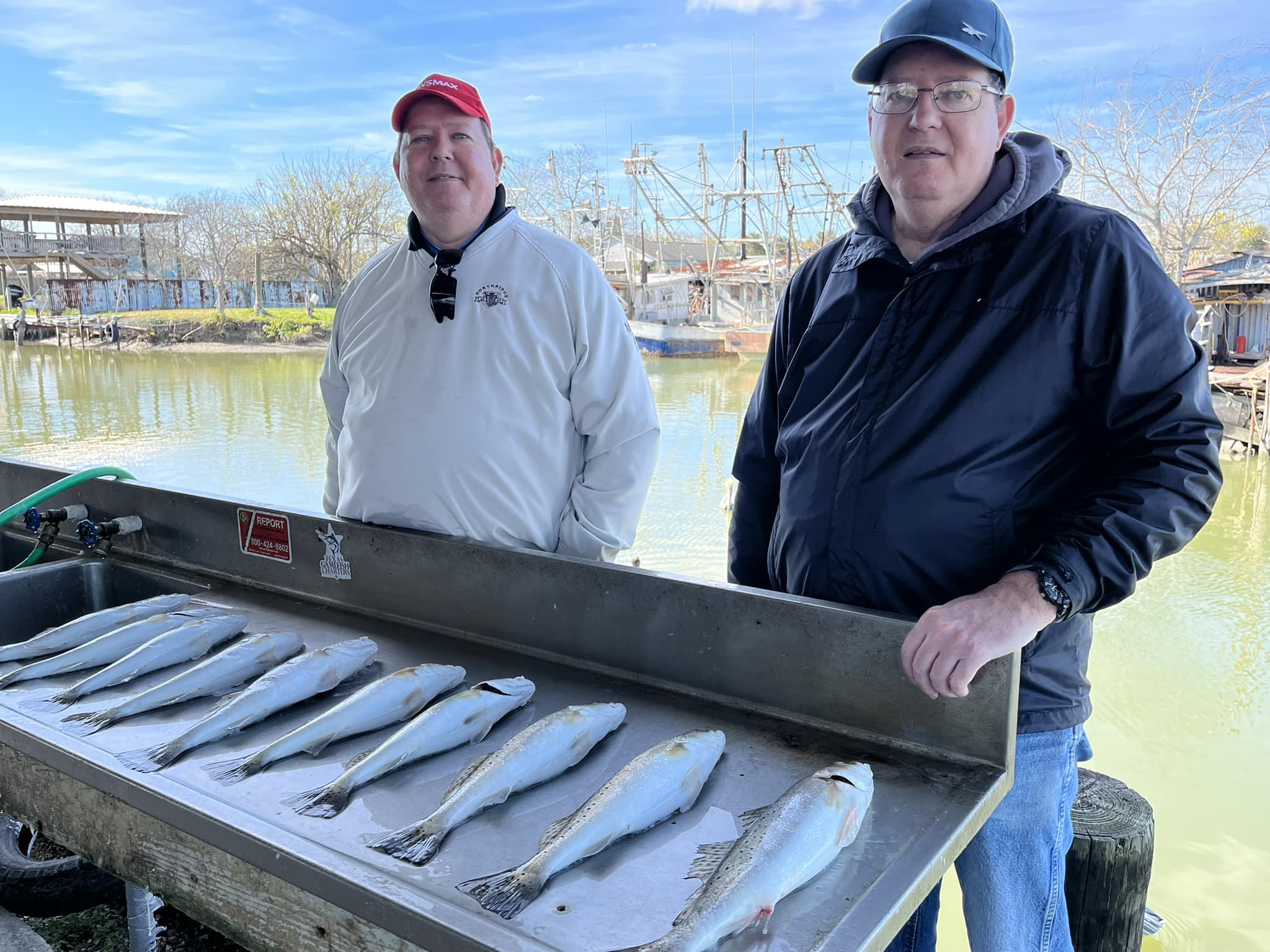 Two anglers enjoying a fishing trip in Texas City