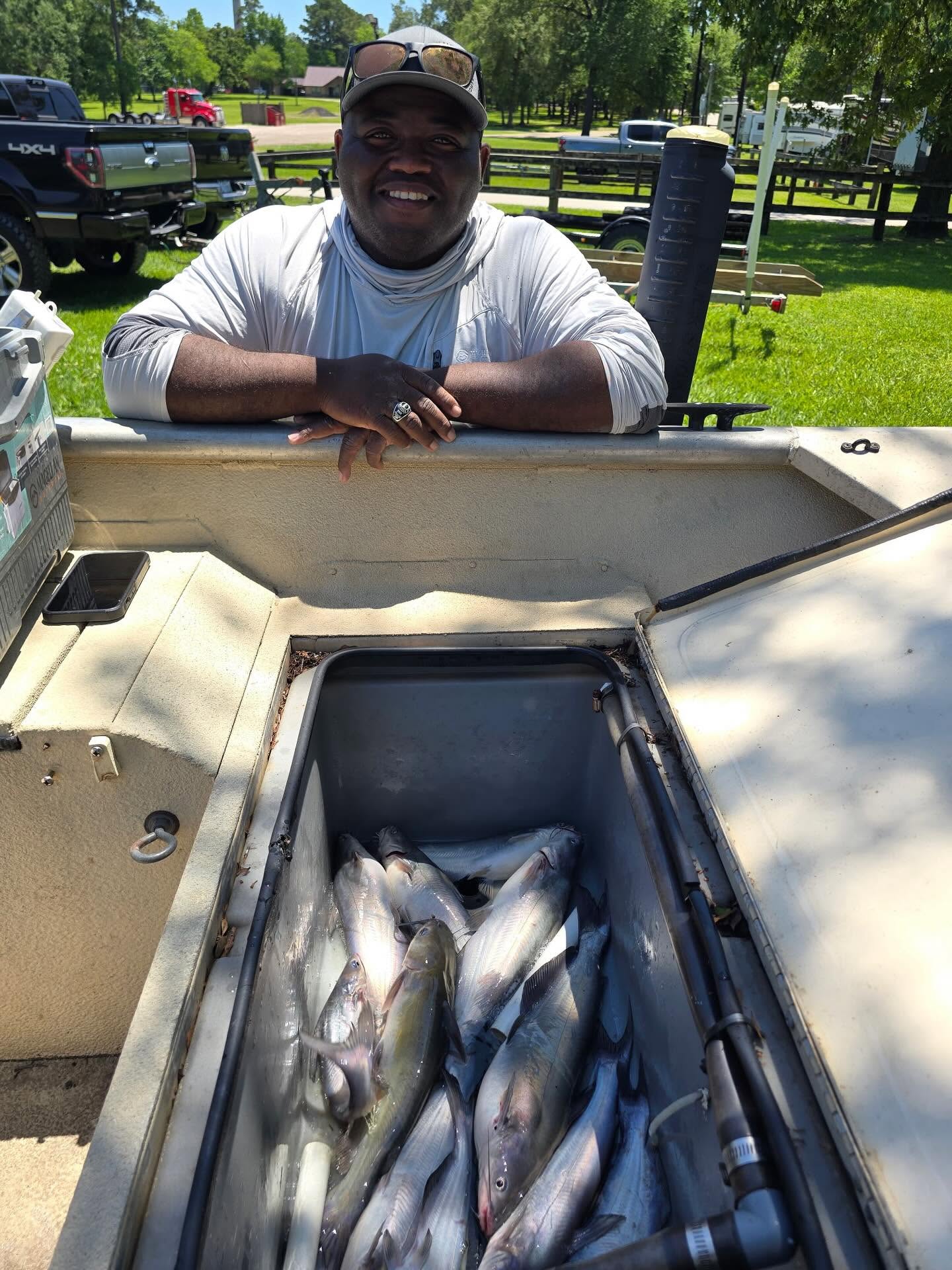 Successful catfish fishing trip in Port Arthur TX with live well full of white catfish and blue catfish
