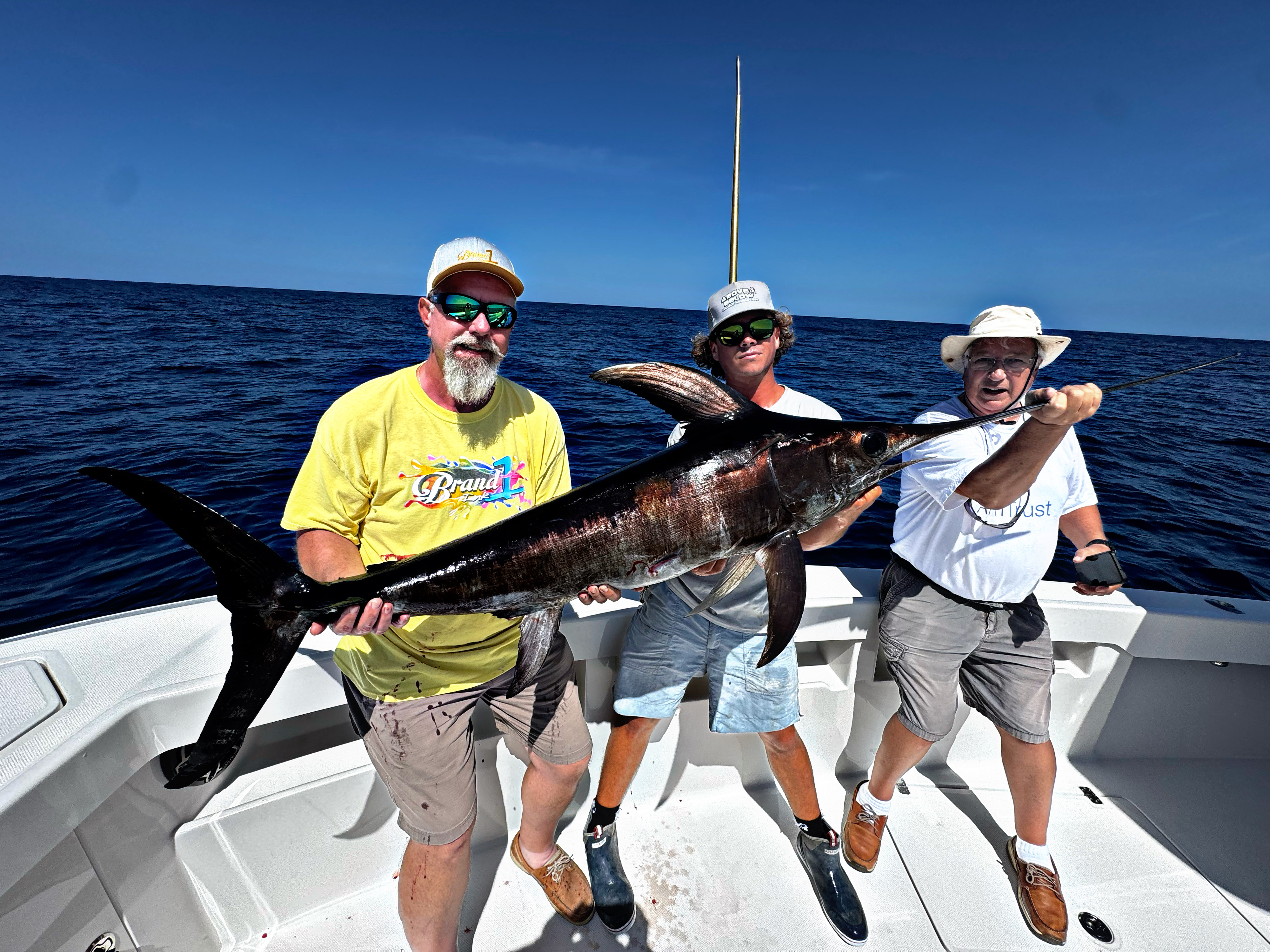 Swordfish caught by three people fishing in Cudjoe Key