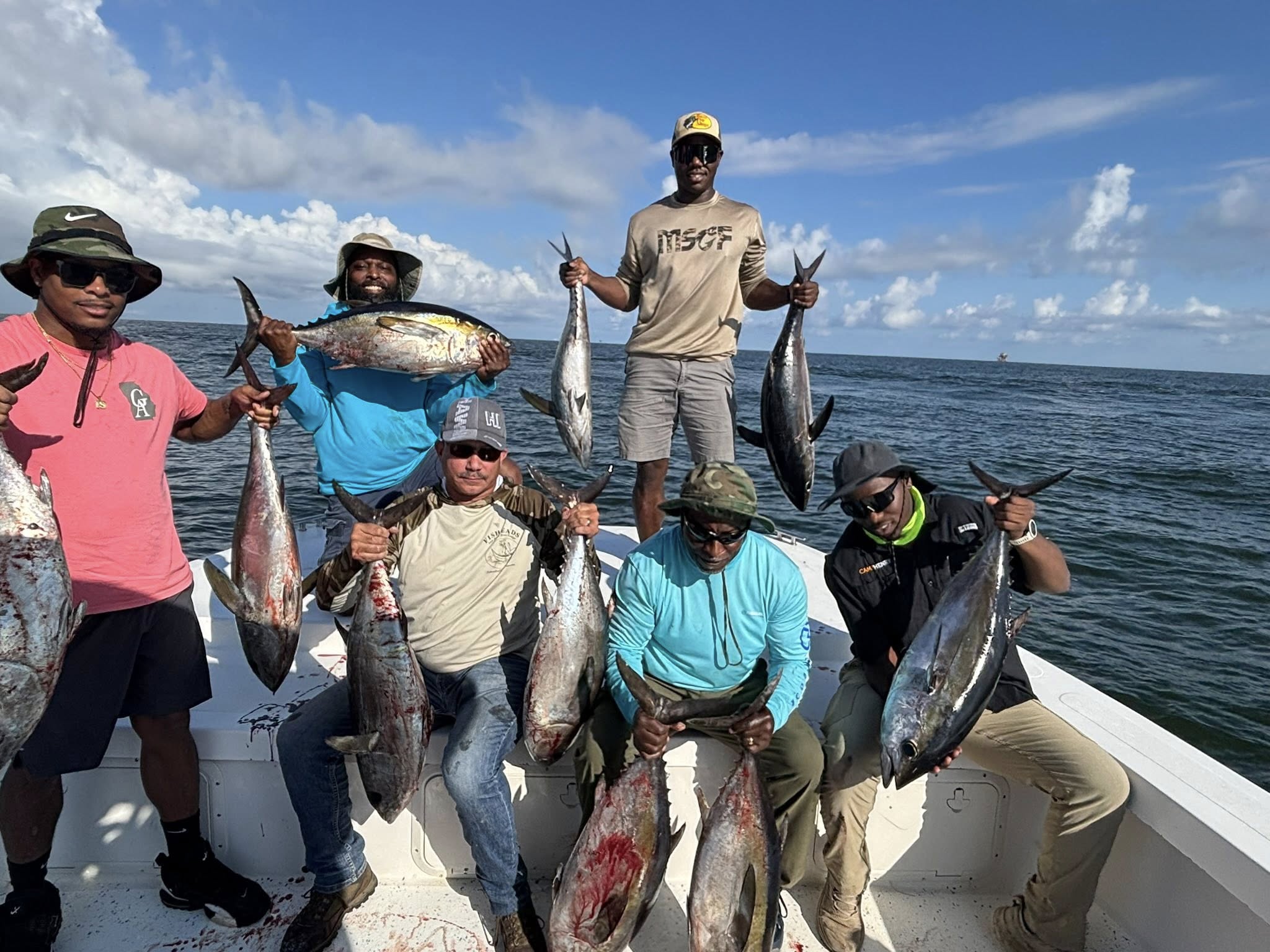 8 Wahoo Fish and Great Barracuda caught on a fishing trip at Grand Isle