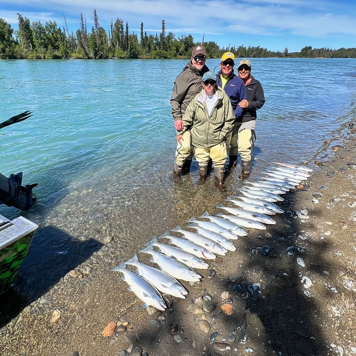 4 people fishing in Alaska