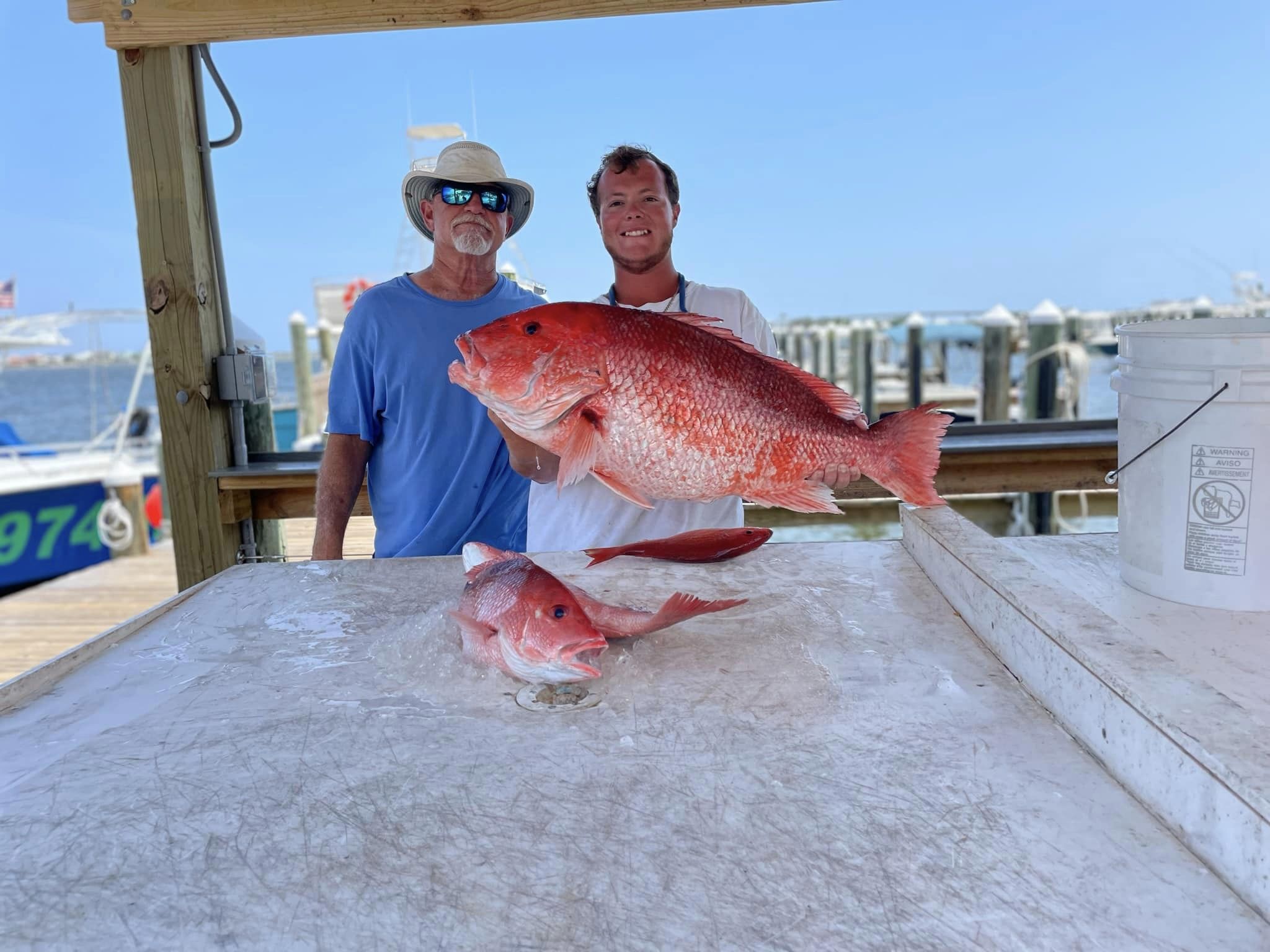 A pair of anglers enjoying a fishing trip in Alabama
