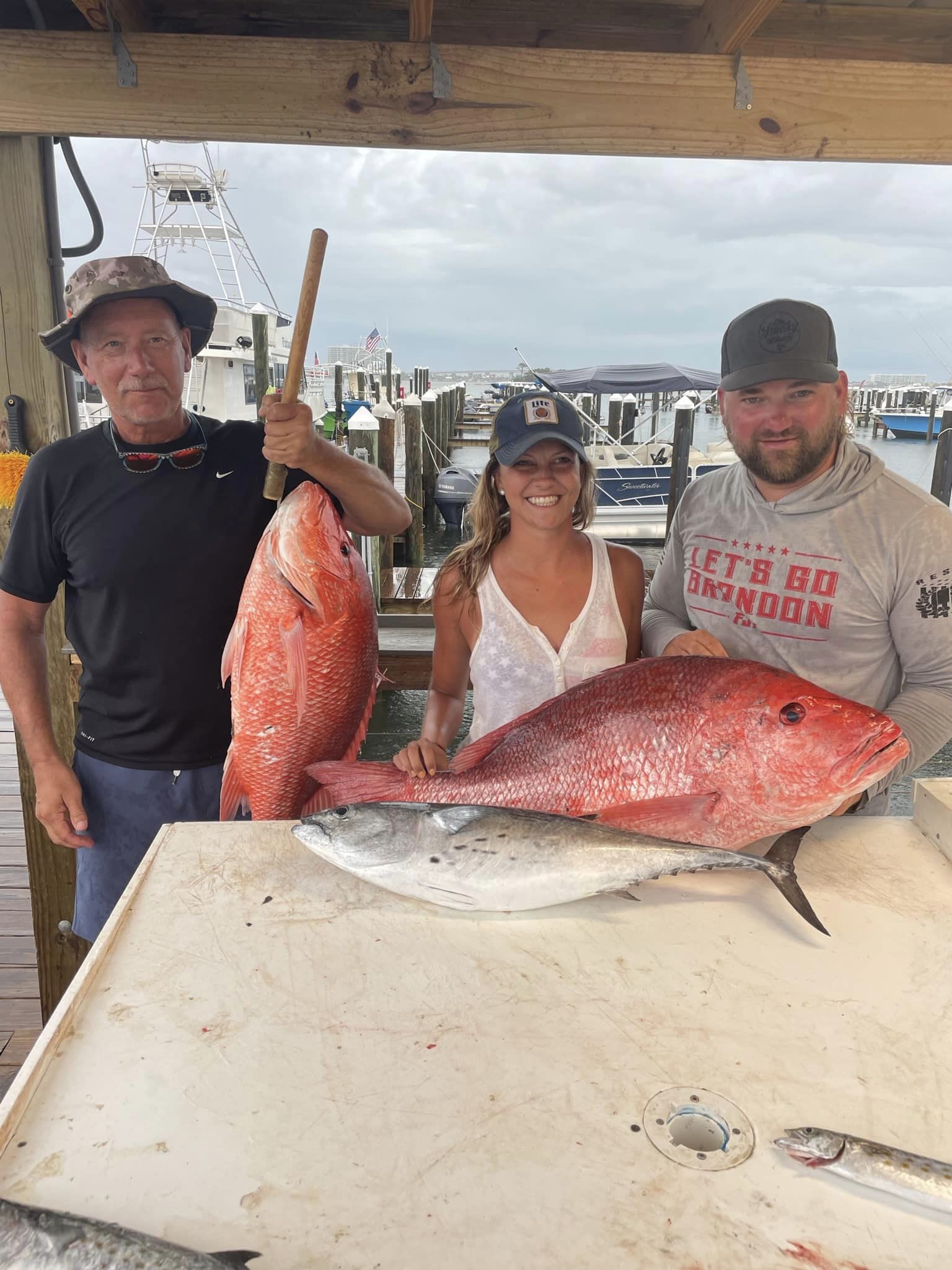 Three little tunny fish caught during an Orange Beach fishing trip