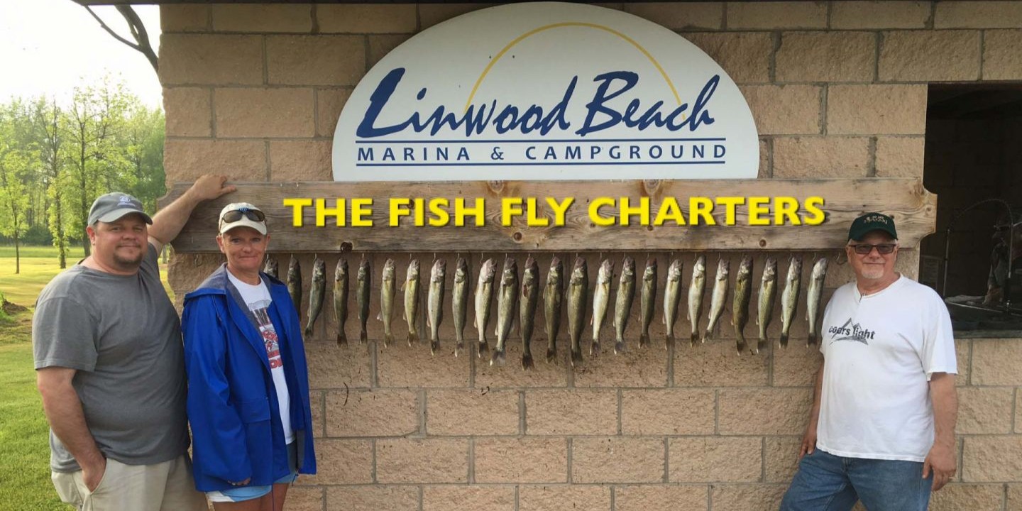 Three people enjoying a fishing trip in Linwood