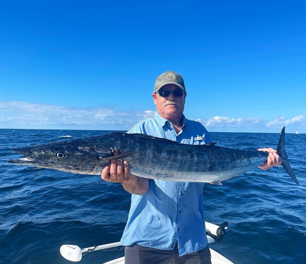 A person fishing in Santa Rosa Beach