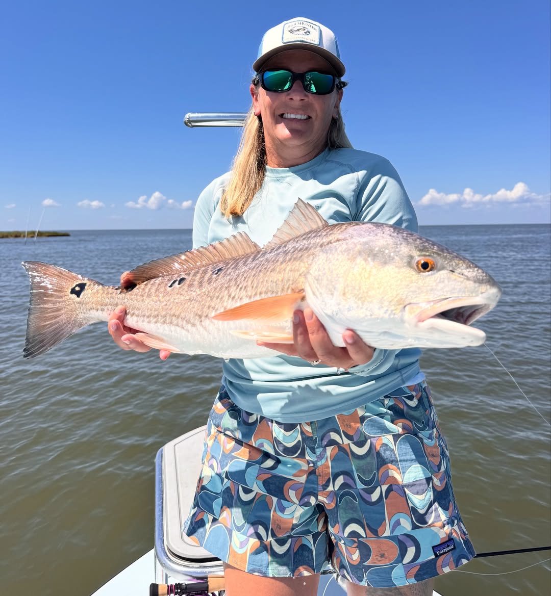 A single person fishing in the ocean at Ocean Springs