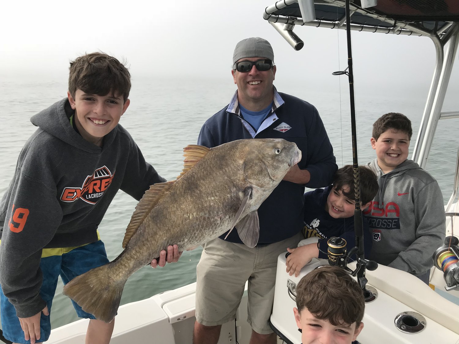 Angler with a large black drum fish in FL