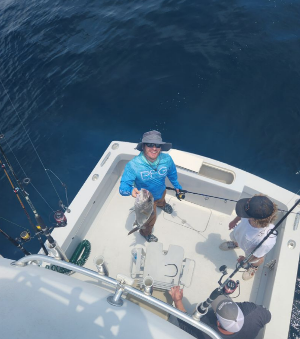 Lone fisherman casting line in Wanchese