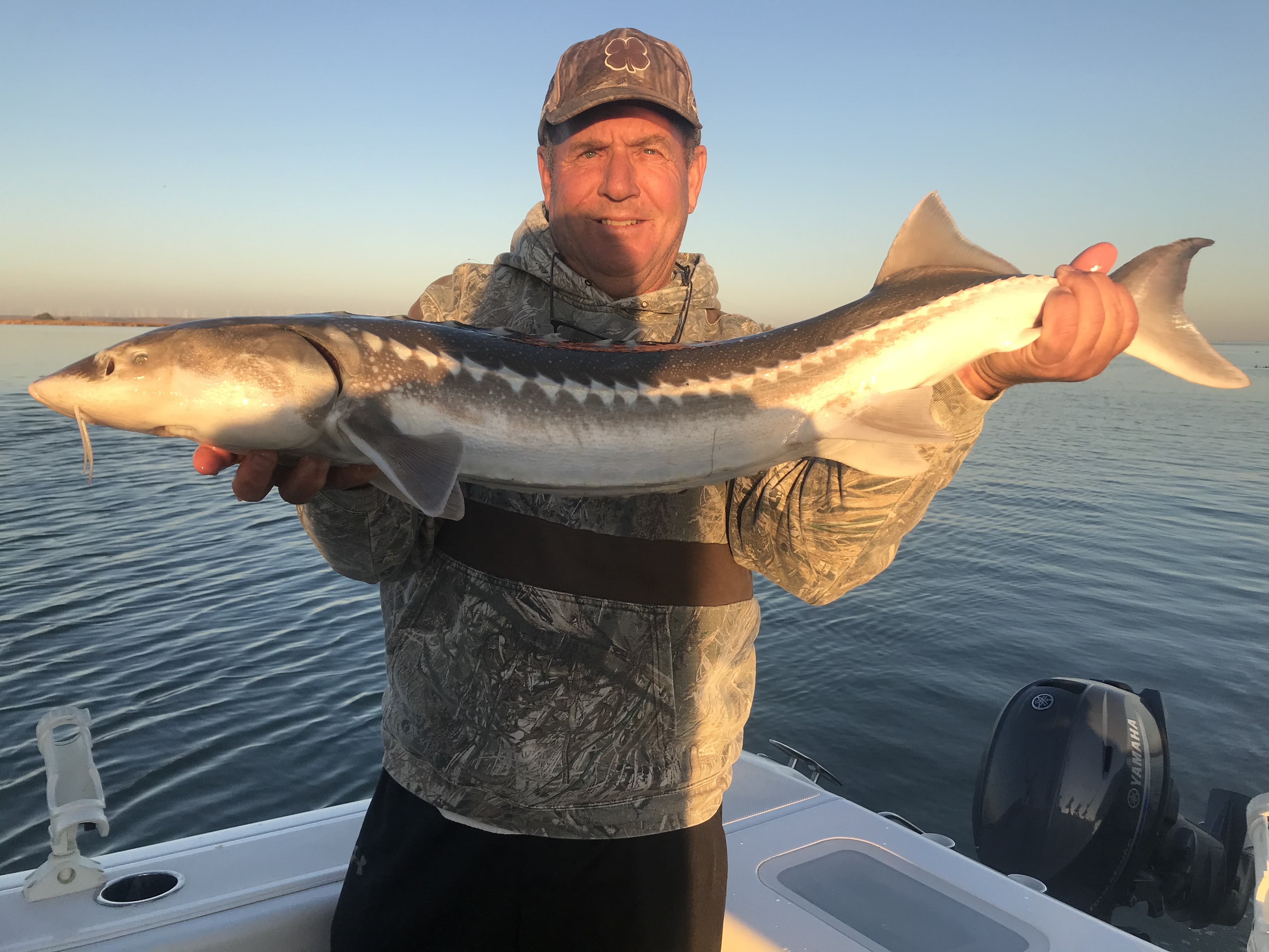 Sturgeon fishing charter boat in Suisun Bay Sacramento River Pittsburg California