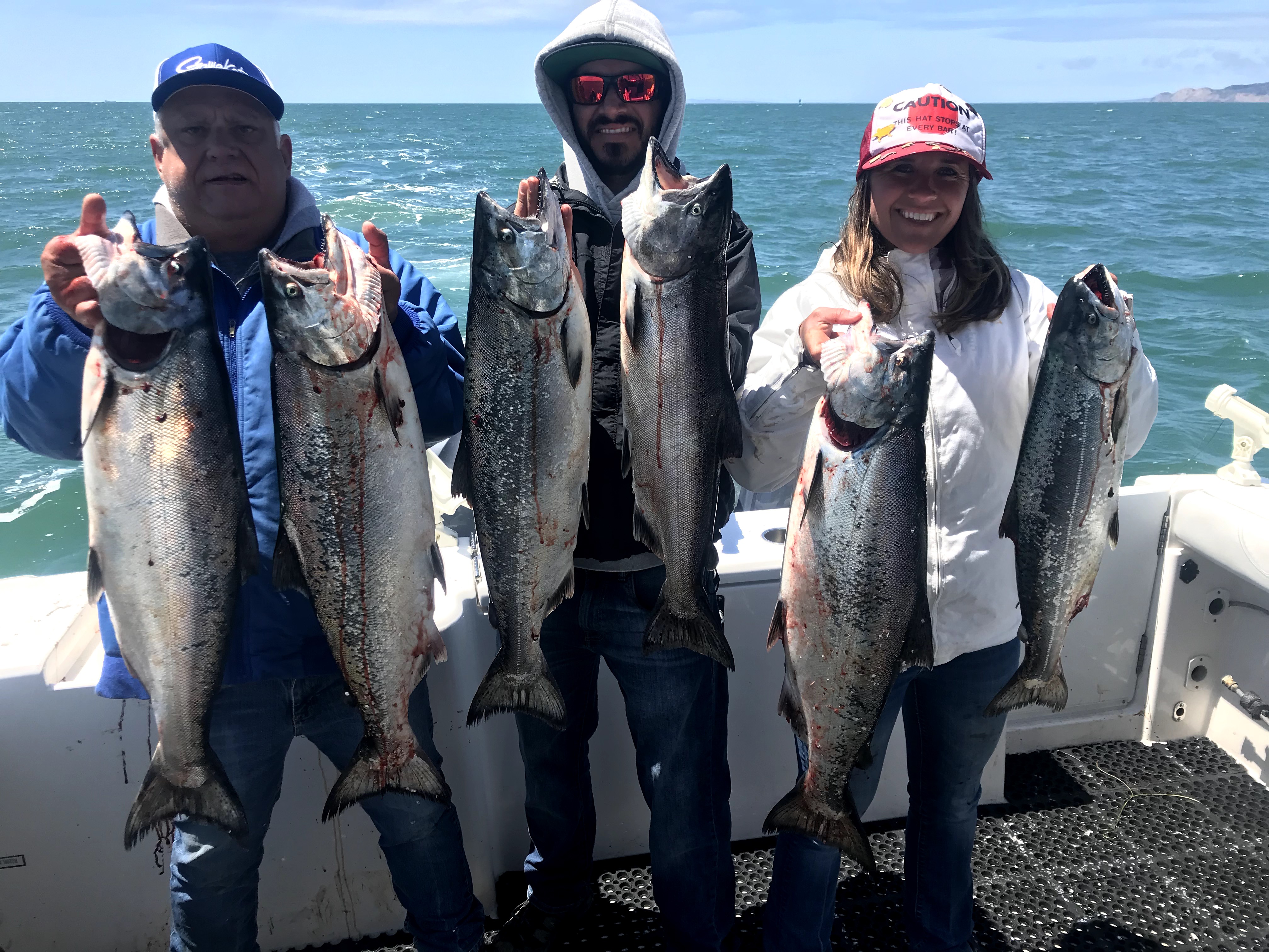 Salmon fishing charter boat with rods and tackle for inshore trip June 27-July 22
